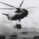 A CH-53 of the 1st Marine Aircraft Wing delivers a generator at An Hoa, Vietnam in 1968. (US Marine Corps)